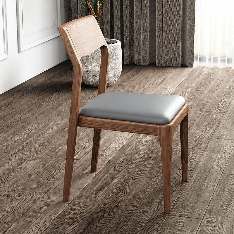 Walnut-Stained Ash Wood Dining Chair with Gray Cat-Claw Upholstered Seat