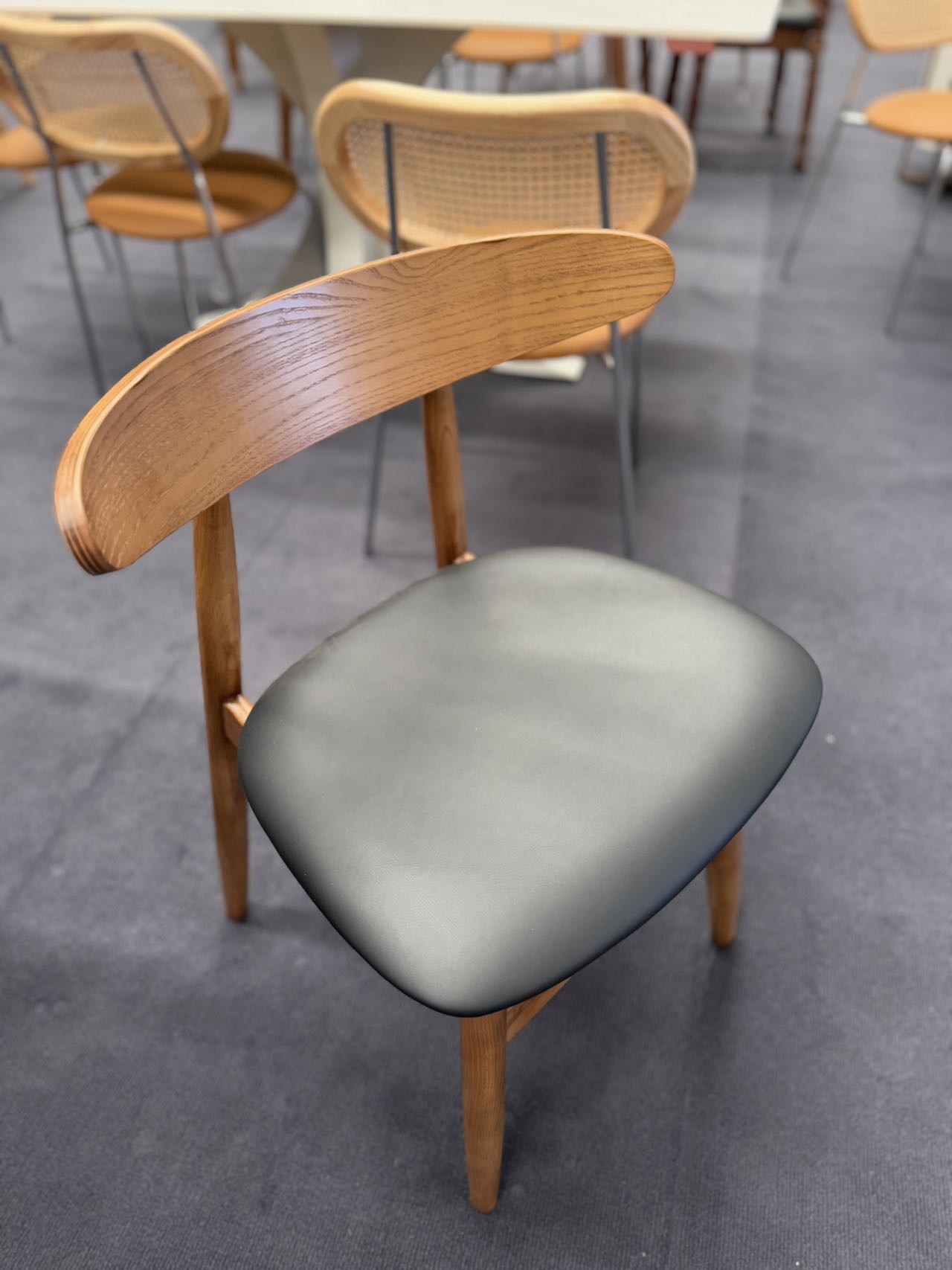 Walnut Black PU Cushion Hansen Chair