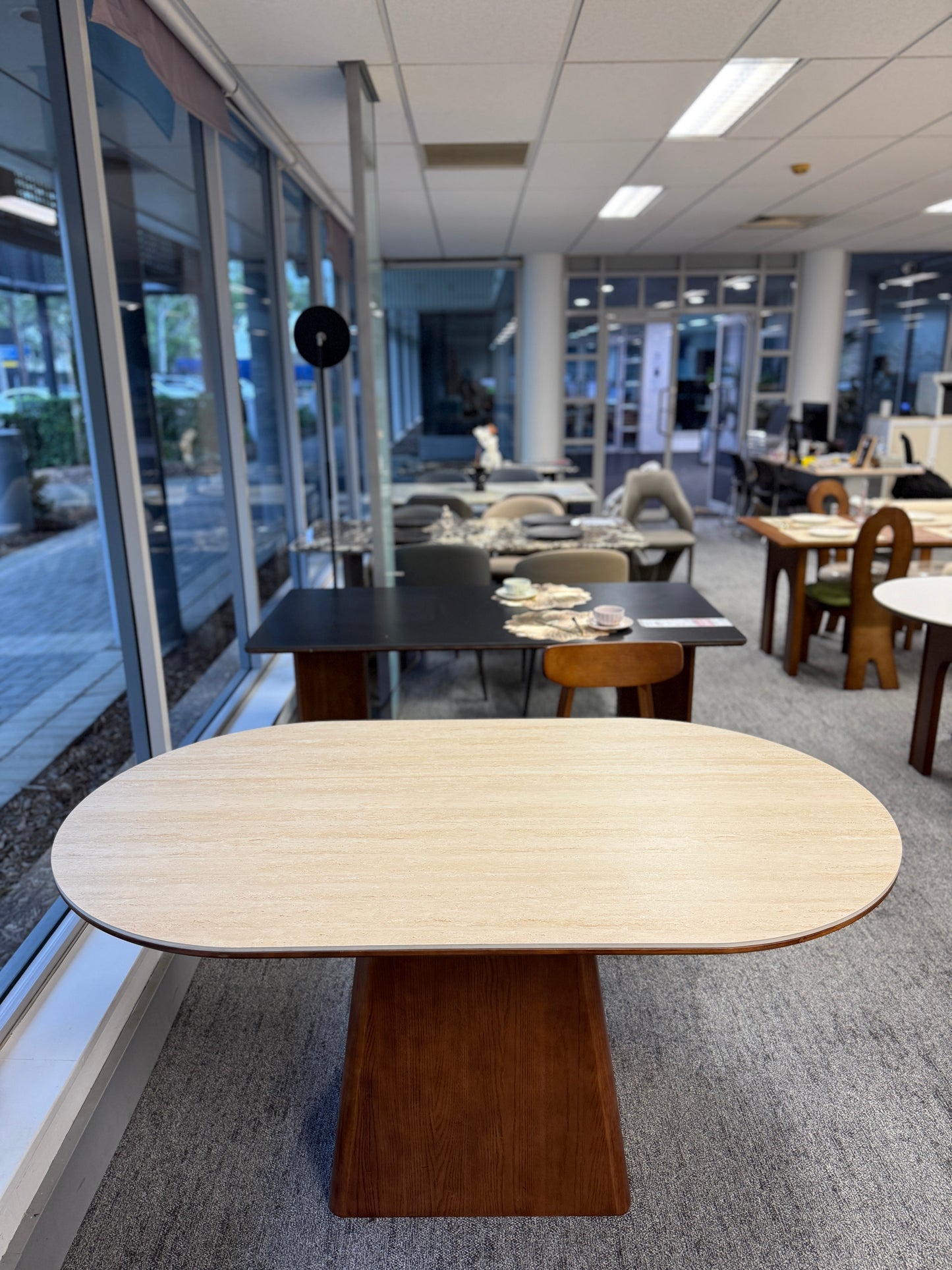 Rock Board Double End Round Dining Table