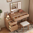 Wooden vanity table with illuminated mirror, drawers, and small stool