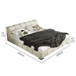 Beige upholstered bed with dimensions labeled on a white background