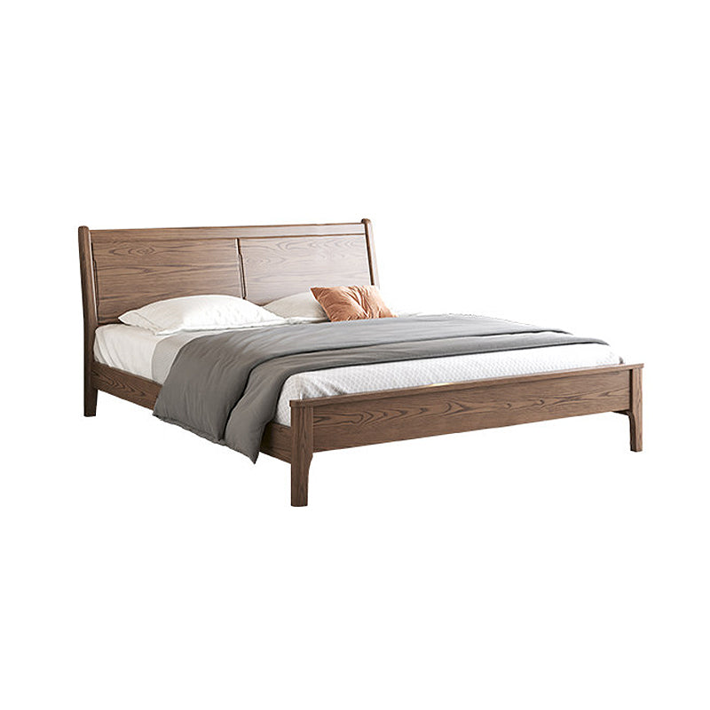 Wooden bed with white bedding and a pillow on a white background