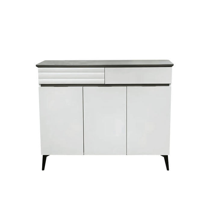 White cabinet with black top on a white background